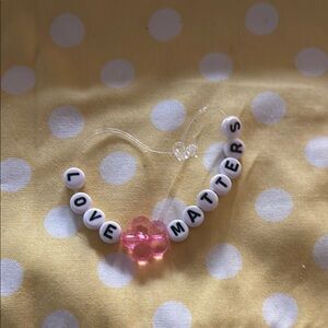Pink and White Beaded Jewelry Accessory